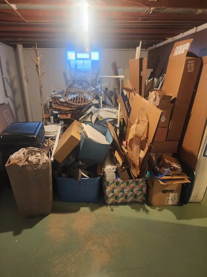 Roll-off dumpster container at job site for 15 Yard Dumpster Rental in Dunlap